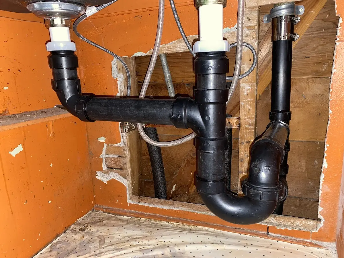 Professional Garbage Disposal Repair equipment and tools on the job in Yucca Valley